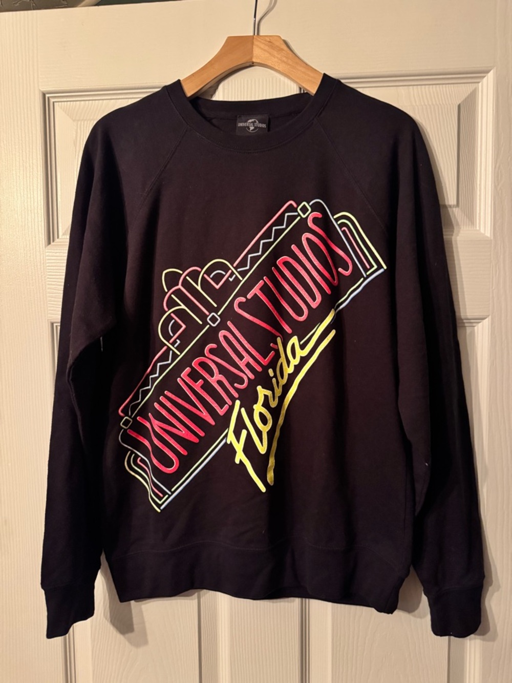 Universal Black Crewneck with Neon Pink and Yellow Script